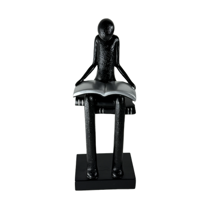 The Silent Reader: Lost in thought, found in pages.