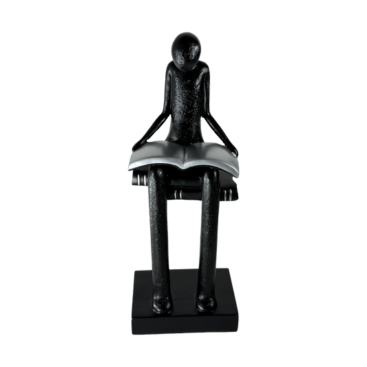 The Silent Reader: Lost in thought, found in pages.